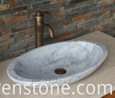 white marble wash basin